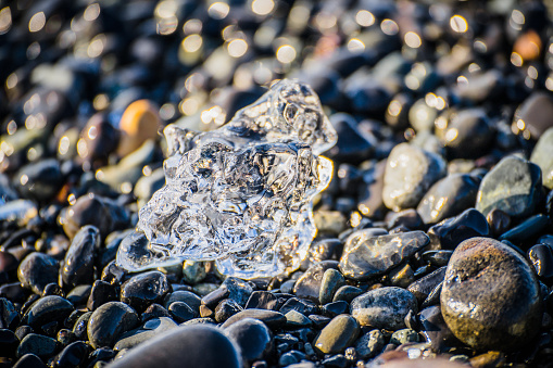 Closeup of the crystal clear little iceberg on Diamond Beach in Iceland