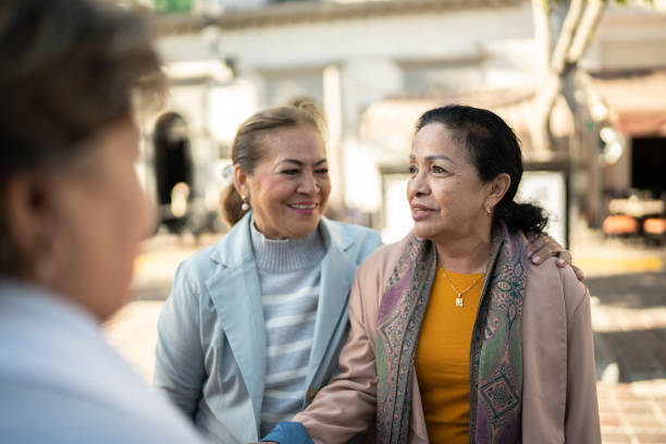 istock Senior friends talking outdoors 1464709399