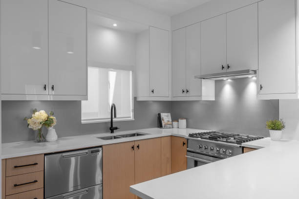 istock View inside a clean and bright colored kitchen in a house 1464711187
