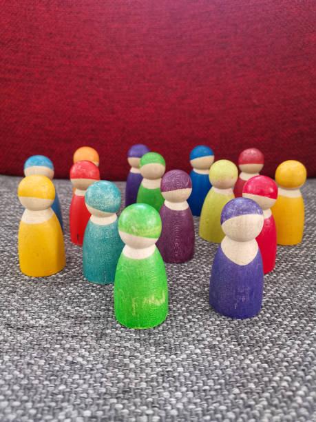 istock Coloured wooden toy men 1464713406
