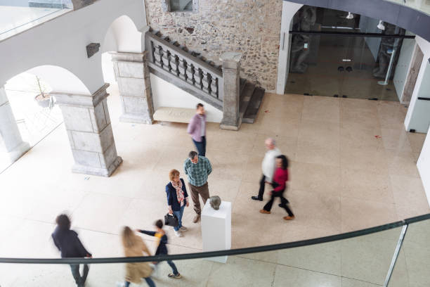istock A Group Of Diverse People Standing In The Museum Lobby 1464714645