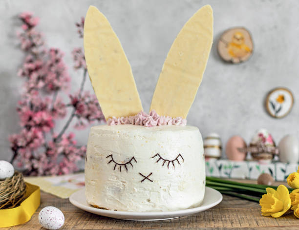 istock Easter cake decorated as a bunny. Holiday, food, desert, spring, easter eggs, flowers. 1464714842