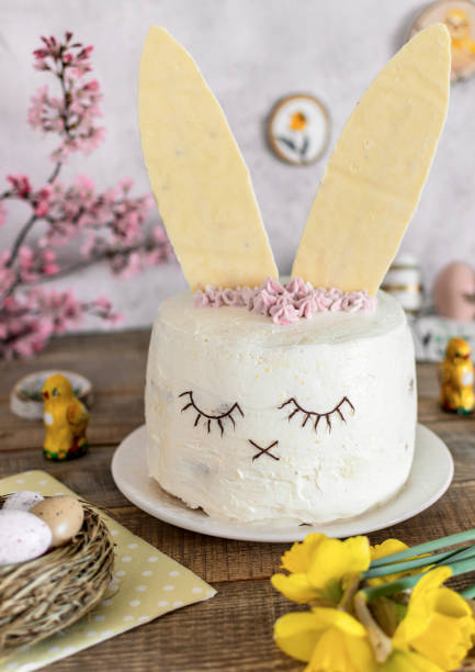 istock Easter cake decorated as a bunny. Holiday, food, desert, spring, easter eggs, flowers. 1464714846