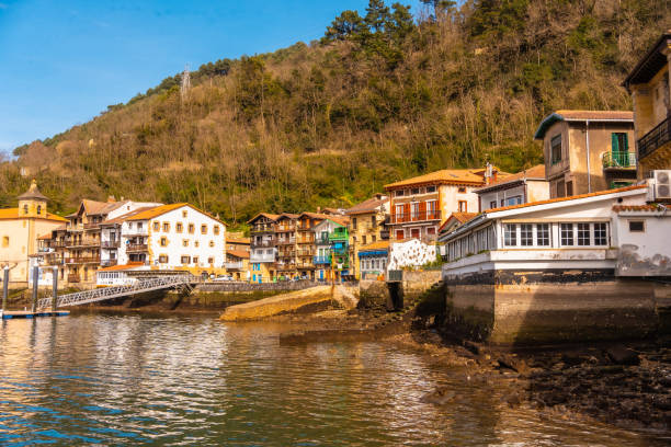 istock Beautiful coastal town Pasajes in Spain surrounded by greenery-covered hills 1464715245