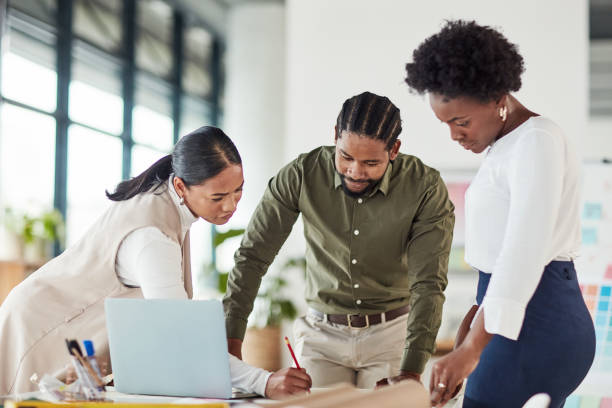 istock Blueprint drawing, collaboration and architect team writing real estate development, architecture engineering or planning. Pen, teamwork communication or people consulting on floor plan design review 1464716398