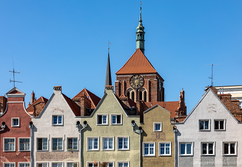 Gdansk, Poland - Sept 9, 2020: Gdansk, Old Town - historic tenement houses with gables on the banks of the River Motlawa, Poland