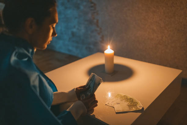 istock A woman counting money during war 1464717860