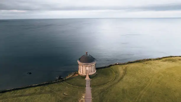 Mussenden Temple is a small circular building located on cliffs near Castlerock high above the Atlantic Ocean on the north-western coast of Northern Ireland.