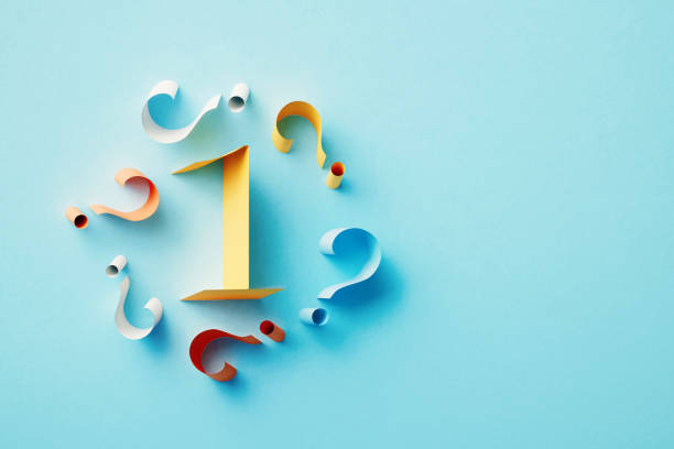 istock Yellow Number 1 Surrounded By Colorful Question Marks On Blue Background 1464723118