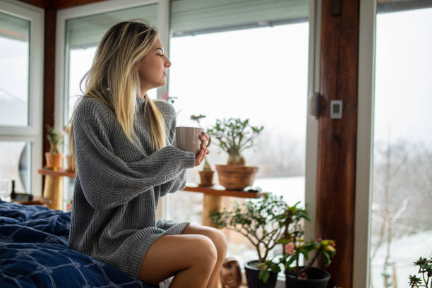 istock Enjoying morning coffee at home 1464724324