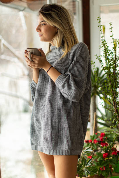 istock Enjoying morning coffee at home 1464724338