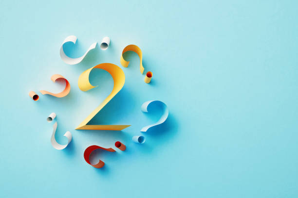 istock Yellow Number 2 Surrounded By Colorful Question Marks On Blue Background 1464724395