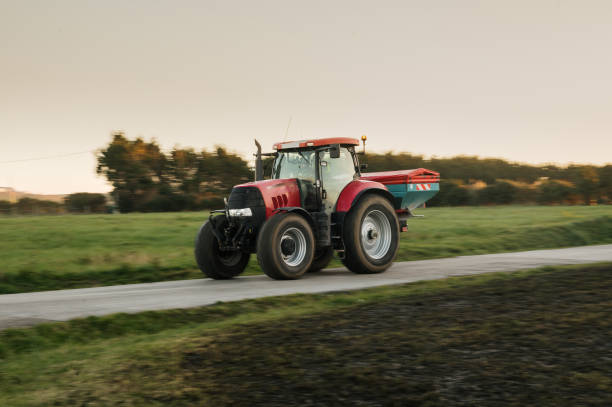 istock Modern agriculture tractor in motion 1464725325
