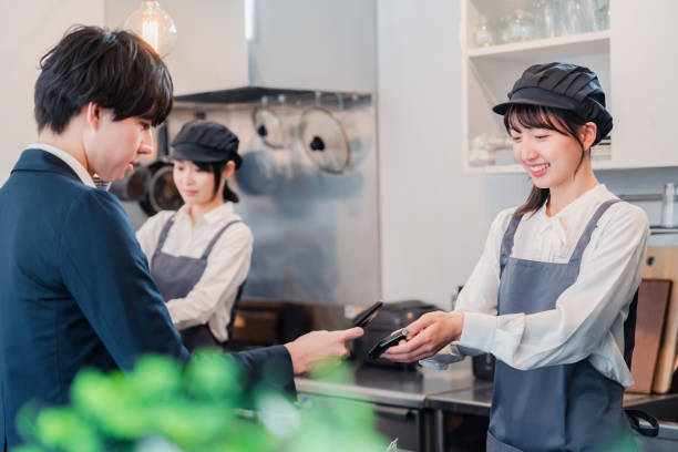 istock A man making a touch payment with his smartphone 1464726586
