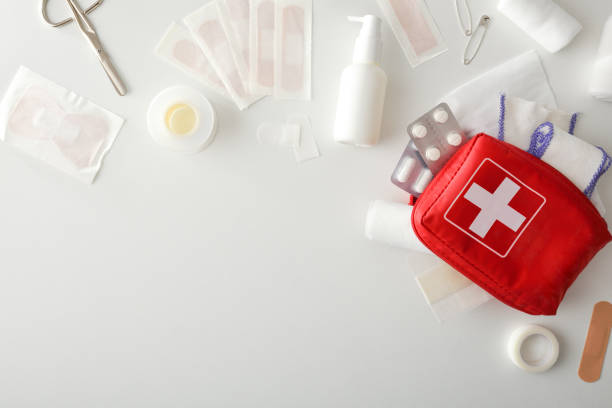 istock Equipment for first aid cures on table with carrying bag 1464727238