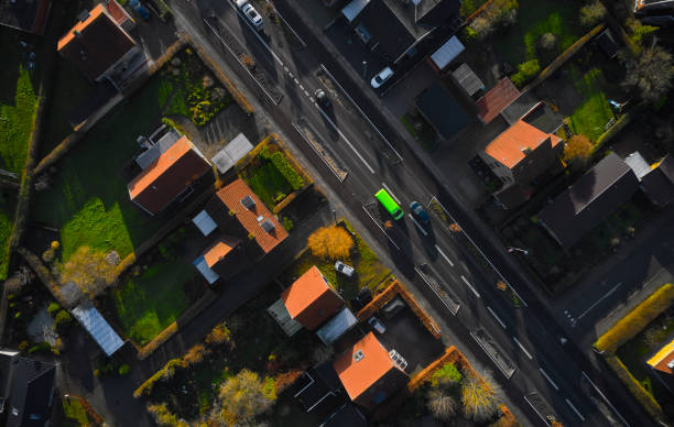 istock Residential district in Odense with green van 1464727262