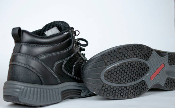istock Black women's leather winter sneakers with laces. No logo 1464727607
