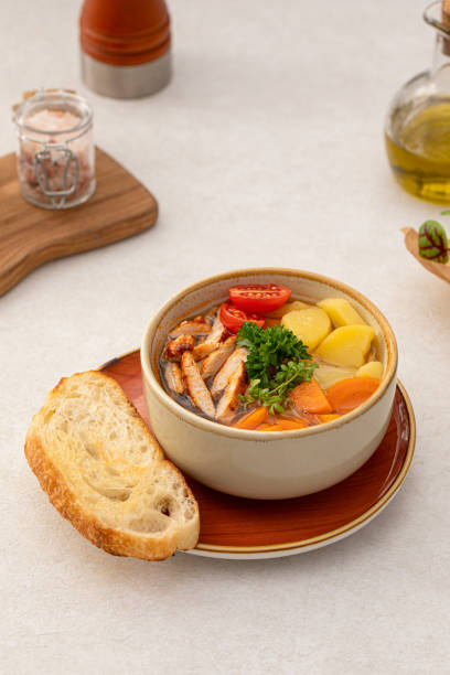 istock Portion of healthy chicken soup with vegetables 1464728983