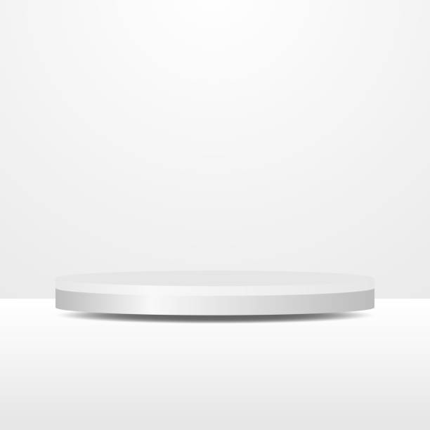 istock blank pedestal. white circular podium for outstanding luxury product showcase display 1464731999