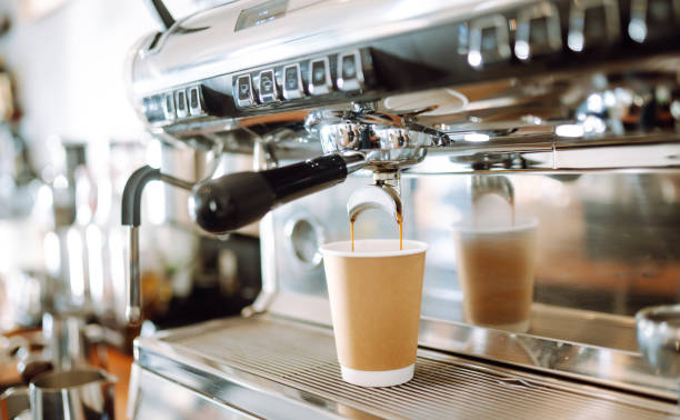 istock Black coffee morning on coffee machine. Takeaway food. 1464737928