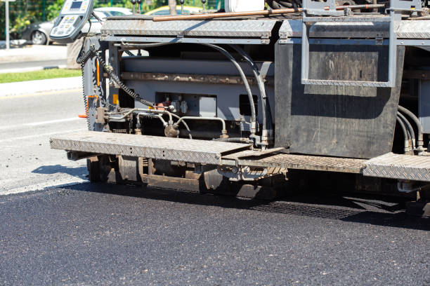 istock Road construction works. Traffic cones at street warning about asphalt pavement works 1464743530