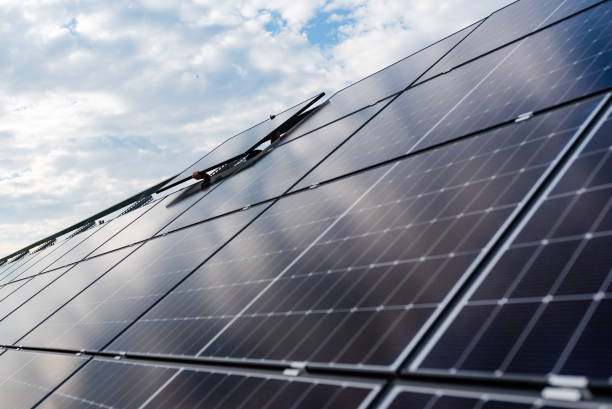istock Photovoltaic panels during installation 1464746203
