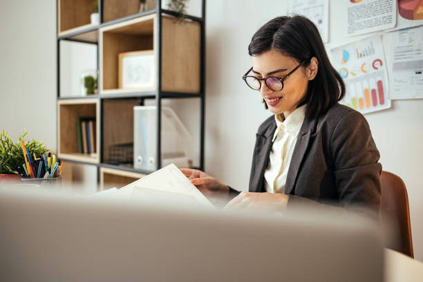 istock Young woman working on a project 1464753115