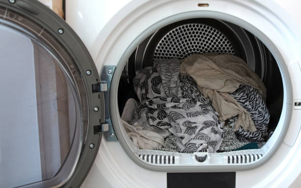 istock Laundry in the tumble dryer 1464753205