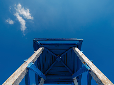 wooden lifeguard tower and blue sky