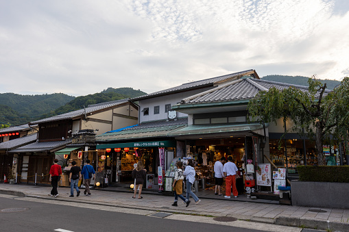 Kyoto, Japan - August 15, 2022 : People at Arashiyama in Kyoto, Japan. Arashiyama is the famous tourist attraction in Kyoto, Japan.