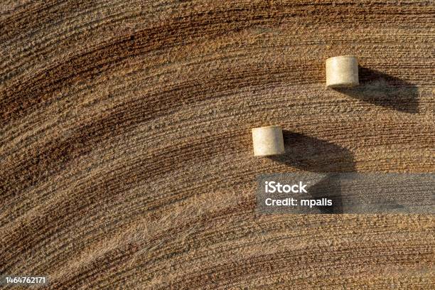 Drone Aerial Of Hay Bales In Agriculture Field After Harvesting Stock Photo - Download Image Now