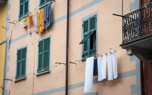 istock Residential House balconies, Green windows, Laundry outdoor. 1464762833