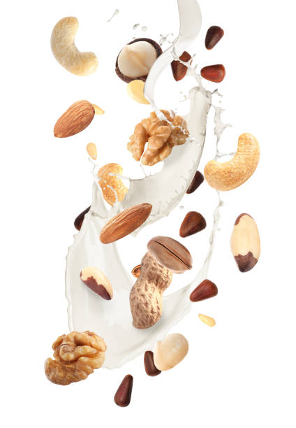 istock Delicious natural nut milk on white background 1464770107
