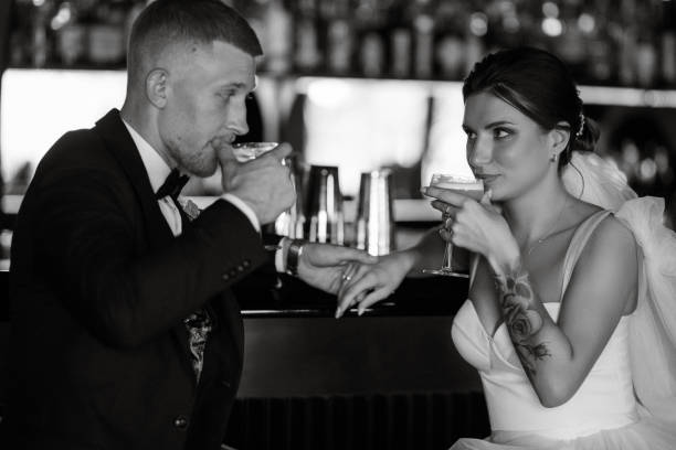 istock bride and groom inside a cocktail bar 1464771649