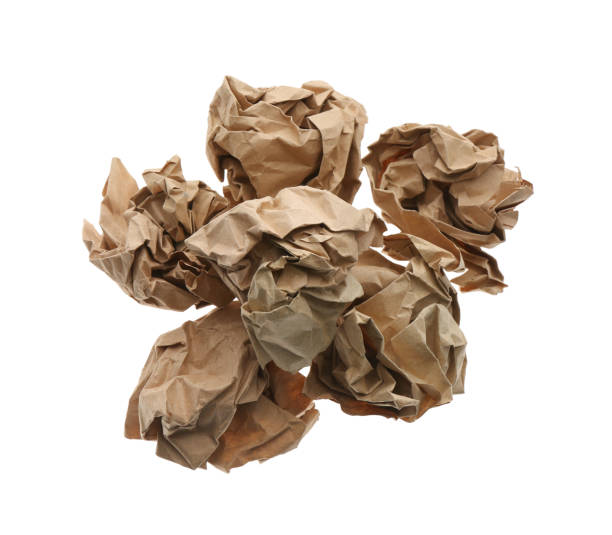 istock Crumpled sheets of kraft paper on white background, top view 1464771794