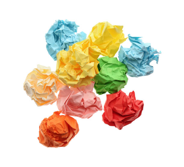 istock Crumpled sheets of color paper on white background, top view 1464772319