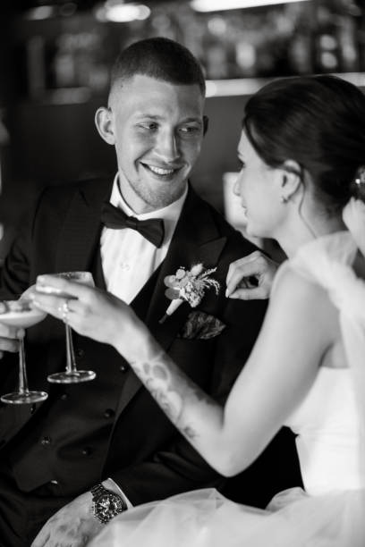 istock bride and groom inside a cocktail bar 1464772861