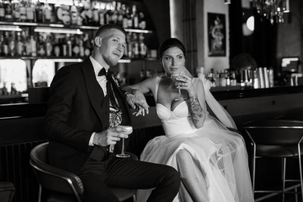 istock bride and groom inside a cocktail bar 1464772922
