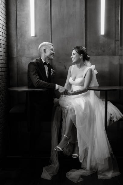 istock bride and groom inside a cocktail bar 1464773012