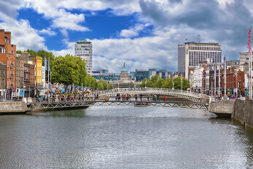 View of Liffey river in Dublin with Ha'penny Bridge, Ireland