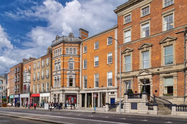 Dublin, Ireland-July 1, 2019: views of neighborhoods of historic Dublin with pubs in the entertainment district at dusk.
