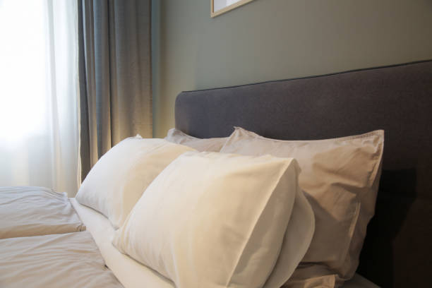 istock King size bed in simple and cozy bedroom. 1464779927