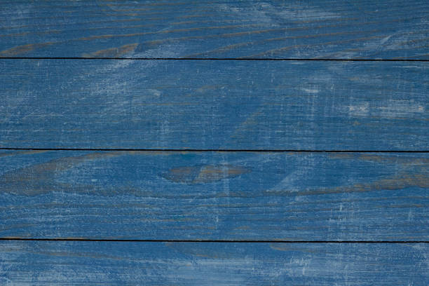 istock Painted wooden board for design or text. Colored wood abstraction. 1464781457
