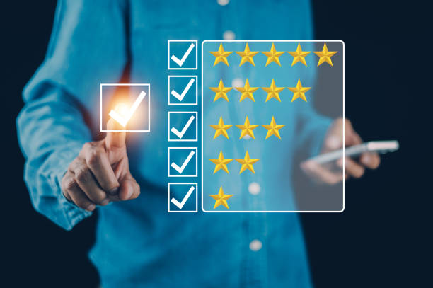 istock Customer review concept, Increase rating, evaluation and classification concept. Businessman draw five yellow star to increase rating of his company. 1464782036