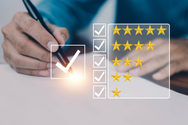istock Customer review concept, Increase rating, evaluation and classification concept. Businessman draw five yellow star to increase rating of his company. 1464782050