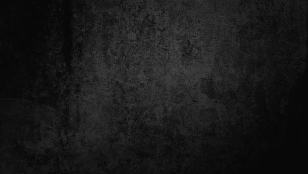 istock black wall texture rough background. grunge dark concrete. stained cement texture, rusty rough dark grey textured concrete wall background with blank space for design. old weathered wall. 1464782859