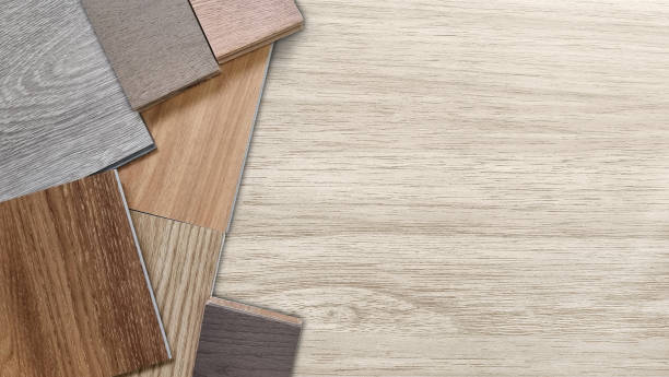 istock samples of interior material, wood, on wooden table with blank space. interior design selected material including various type of engineering and vinyl flooring tiles for construction. mood board. 1464782870