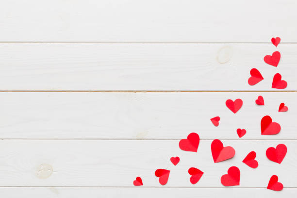 istock Valentine day background with red hearts, top view with copy space 1464787046