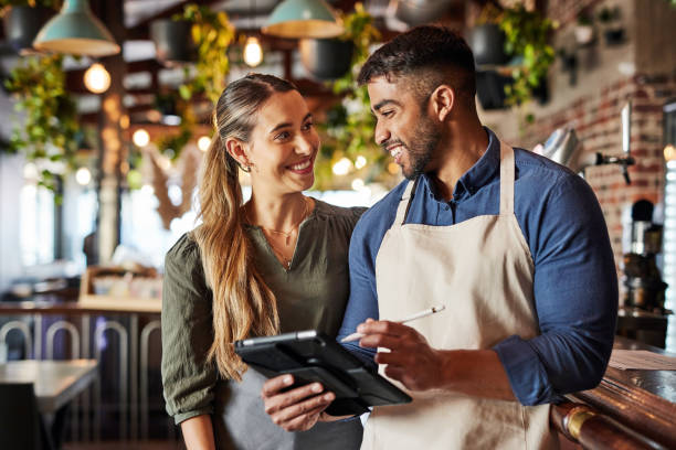 istock Tablet, bartender or small business people on success communication, networking or online order check. Research, planning startup or teamwork for inventory checklist, stock management or social media 1464787927