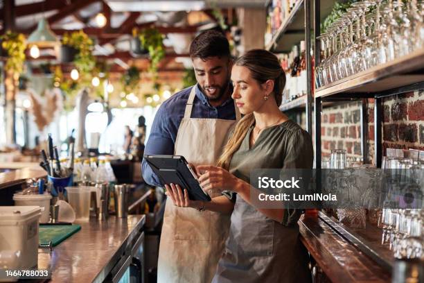 Tablet Bartender Or Small Business People For Communication Networking Or Online Order Check Research Planning Startup Or Teamwork For Inventory Checklist Stock Management Or Social Media Review Stock Photo - Download Image Now